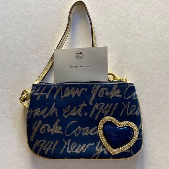 COACH Wristlet New York Script Navy/Gold NWOT - Picture 1 of 4